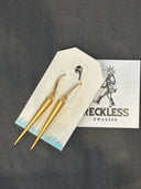 Earrings-Gold spikes on gold cz finding