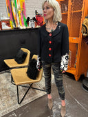 Classic meets punk with this Peter Pan collar Jacket, painted skulls sleeves and back, red accent and buttons