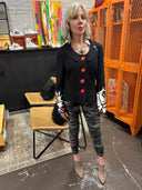 Classic meets punk with this Peter Pan collar Jacket, painted skulls sleeves and back, red accent and buttons