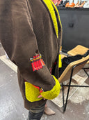 One of kind creation that will make you stand out in this brown corduroy campus jacket with red plaid accent, red buttons & stitching celadon yellow felted wool cuffs and plackets