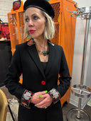 Classic Wool coat with contrasting buttons and swedish style cuff , back belt and pockets