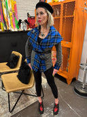 Stricking wrap jacket with blue tartan collar and vegan leather trim and belt, large safety pin brocher