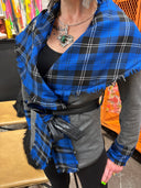 Stricking wrap jacket with blue tartan collar and vegan leather trim and belt, large safety pin brocher
