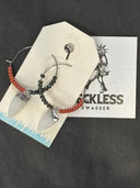 Earrings-Large silver rings w black/orange, white daggers