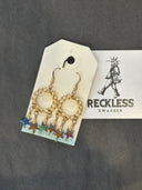 Earrings-Gold rings of rings with 3-star dangles