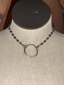 Choker-blue faceted stones with silver ring in front